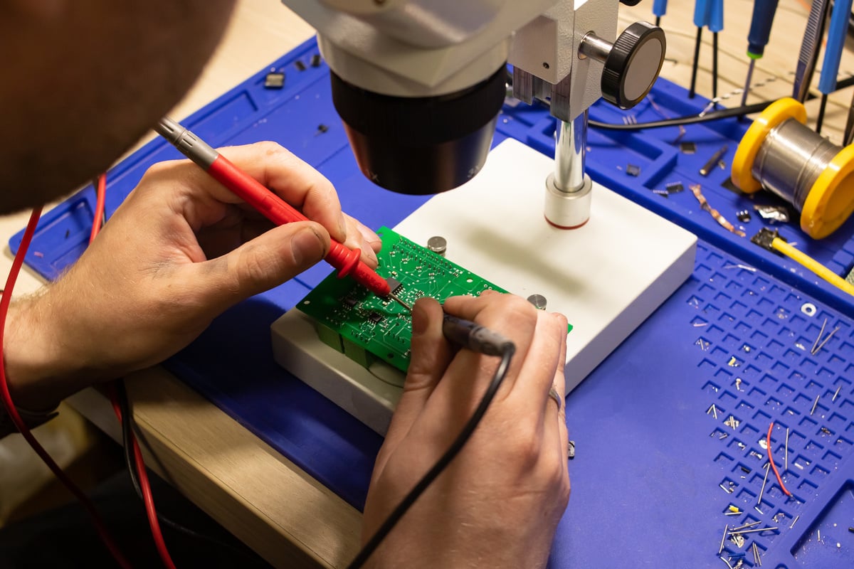 Soldering Process on a Green PCB 